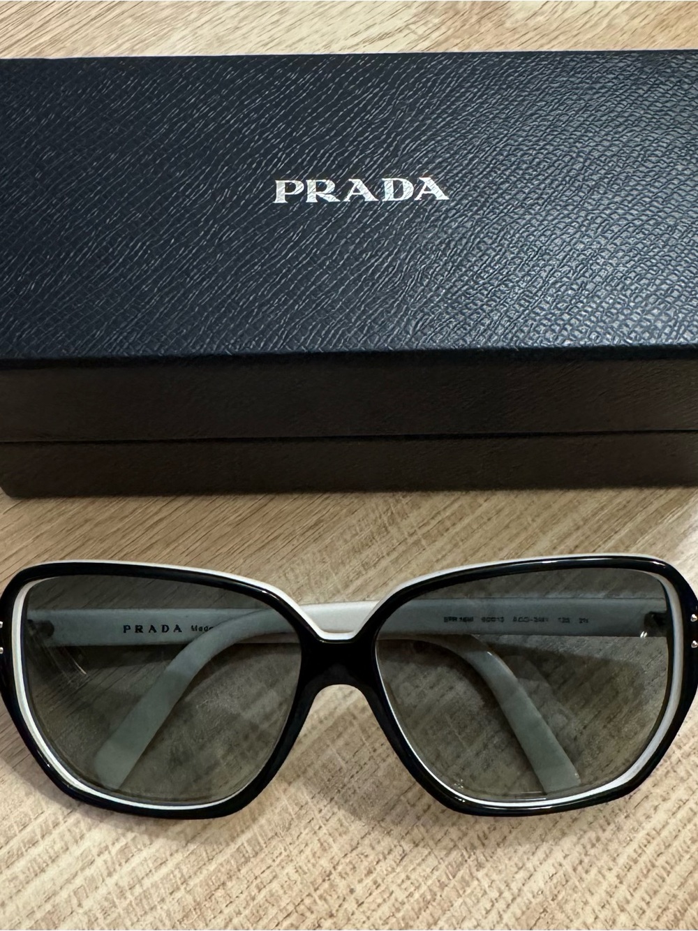 Authentic Prada Sunglasses Featuring Oversized Lenses and a Chic Two-Tone Frame